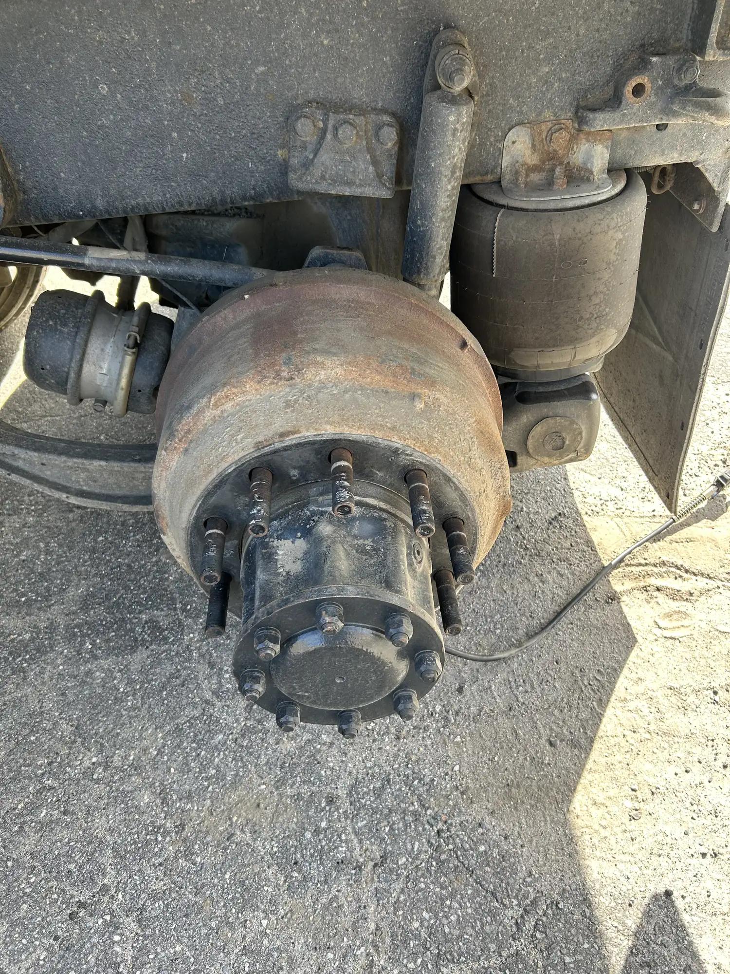 Trailer brake drum and hub removed for wheel seal service