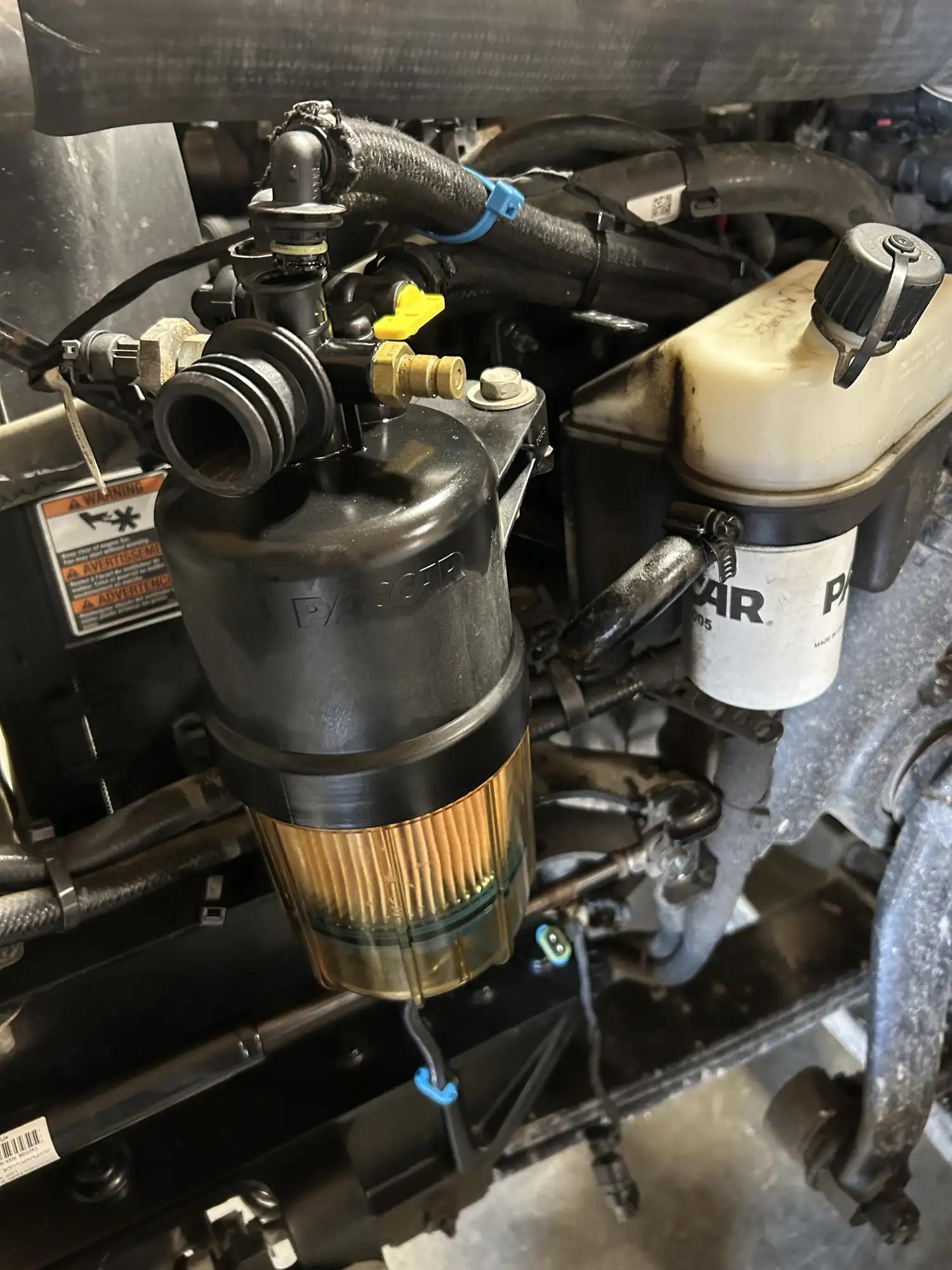 Fuel filter housing on a truck engine during preventative maintenance