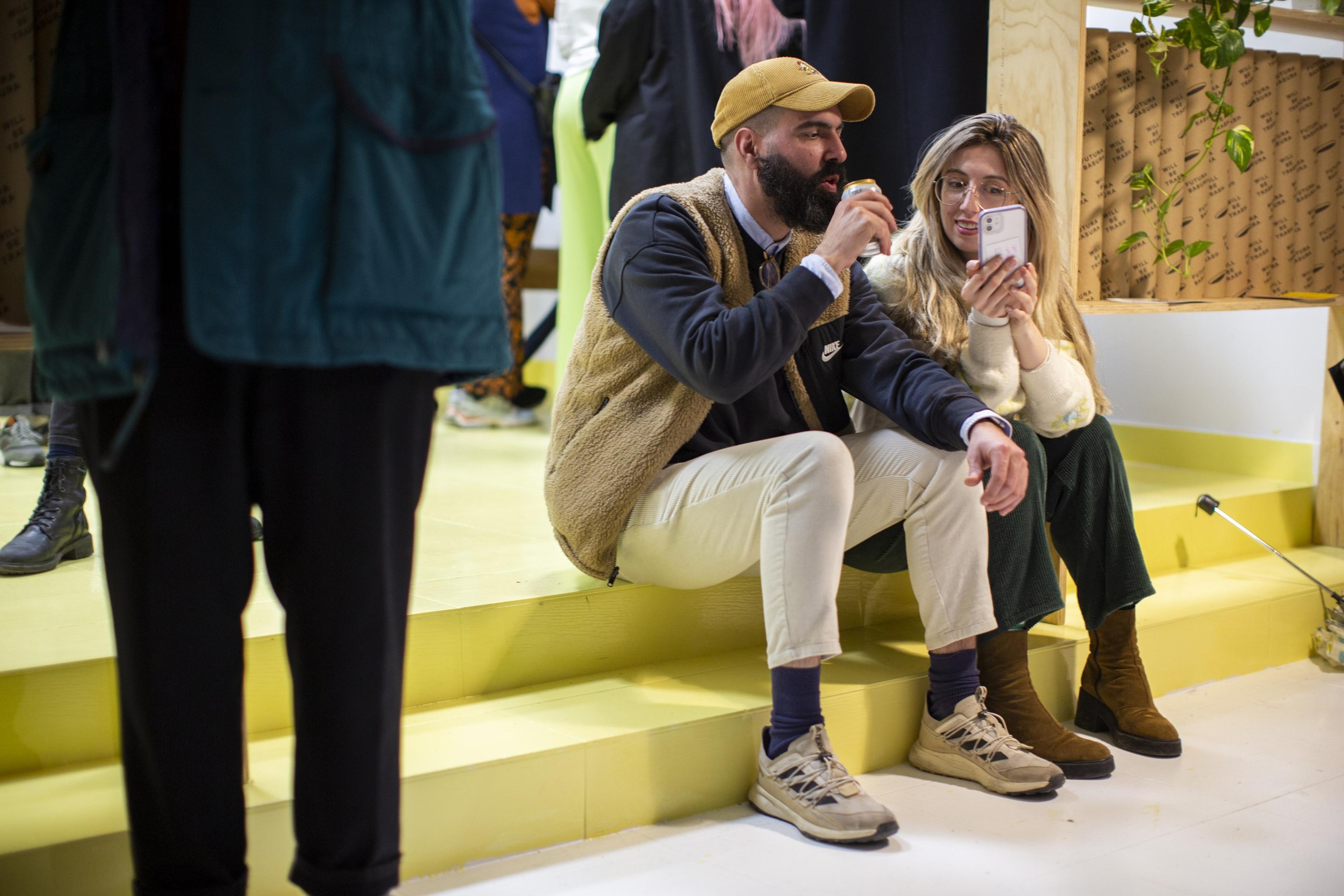 Visitors sitting together at the exhibition