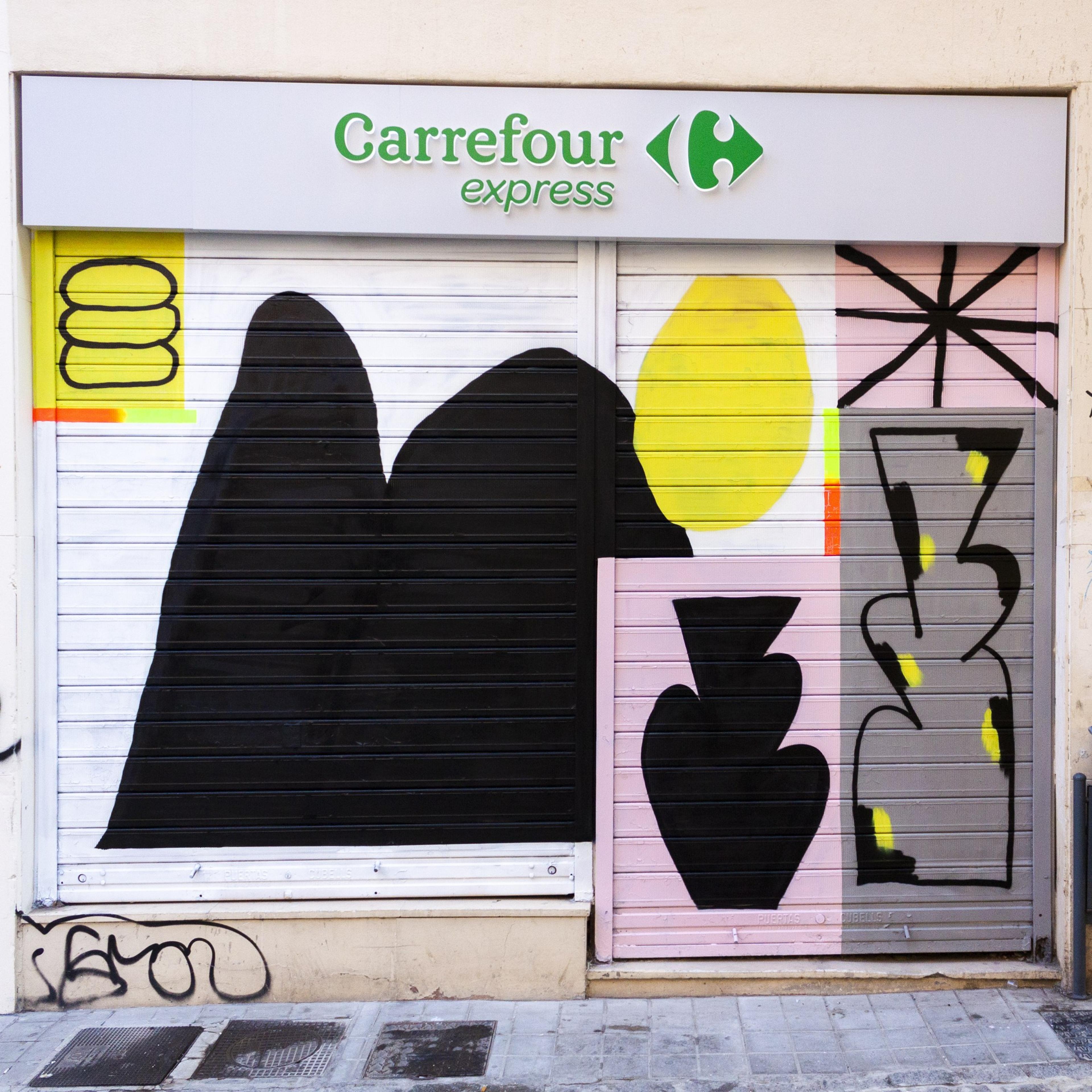 Geometric mural painted on a local shop shutter