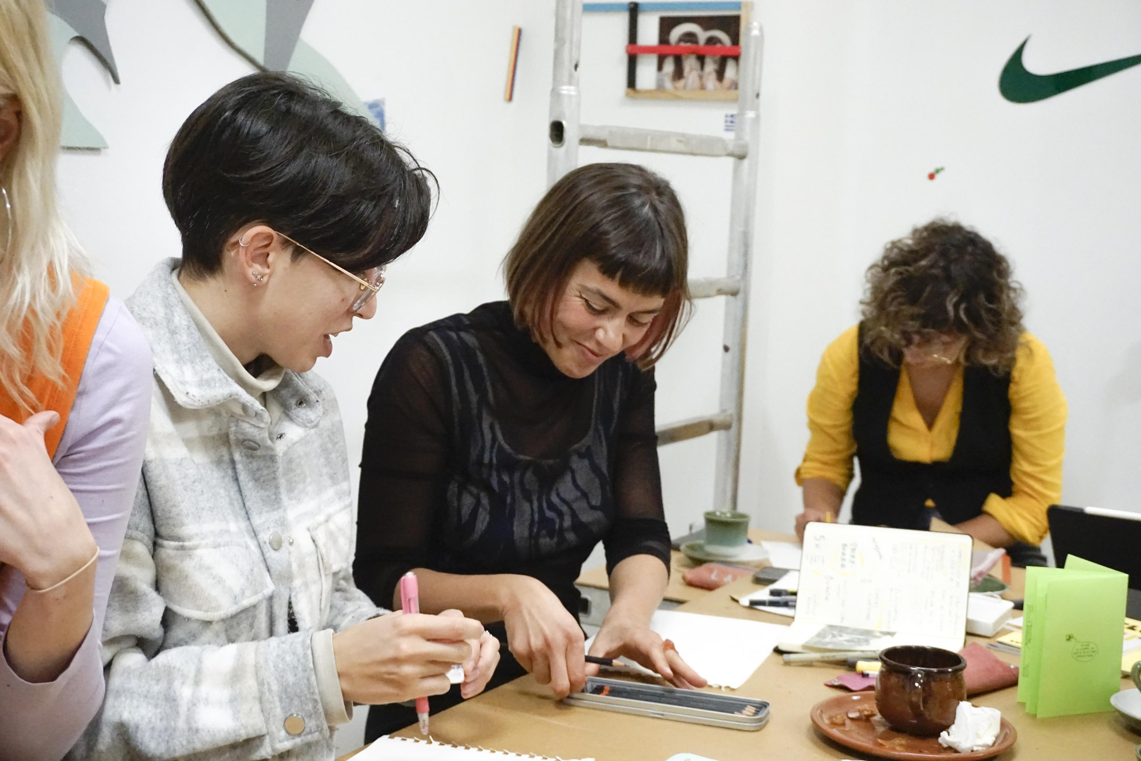 Participants drawing during the comics workshop