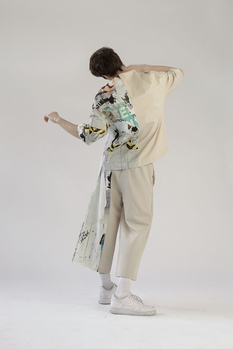 male model turning photographed from the back