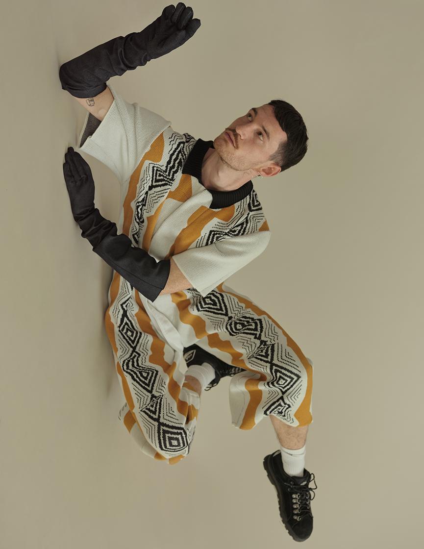 male model laying on floor