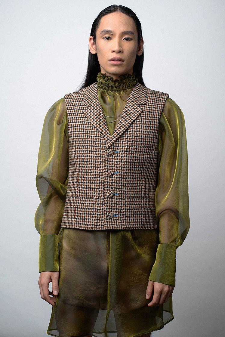 diverse model in dress and vest