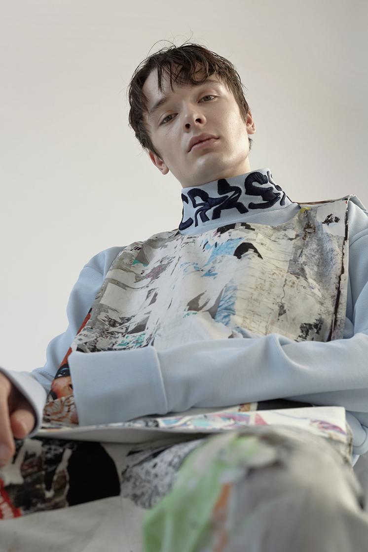 male model looks into tilted camera