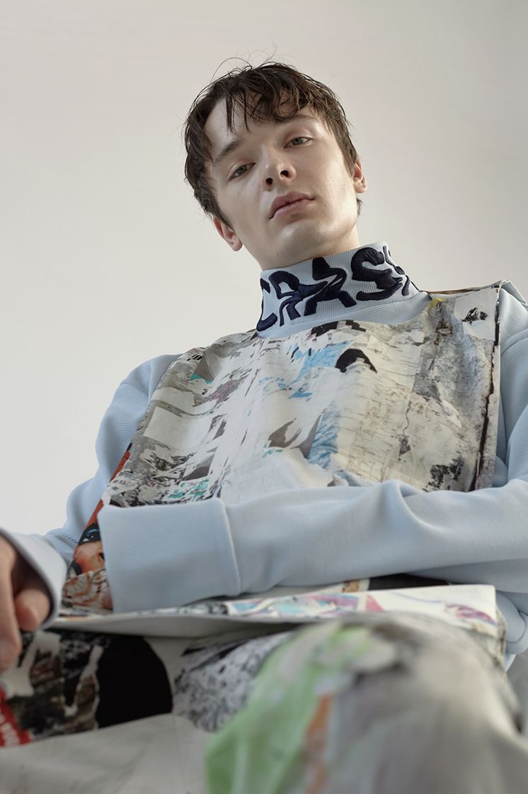 male model looks into tilted camera