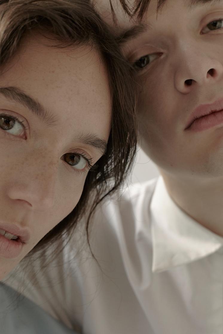 female and male face close up