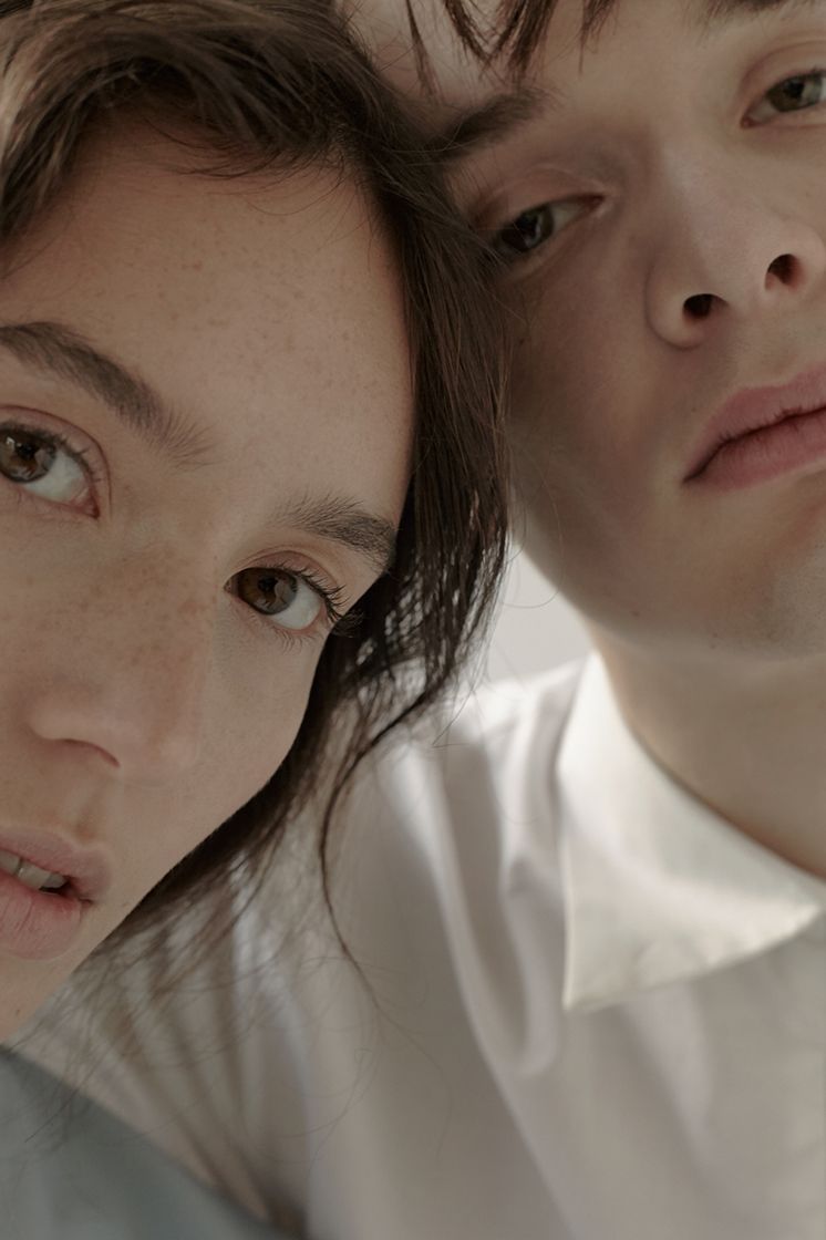 female and male face close up