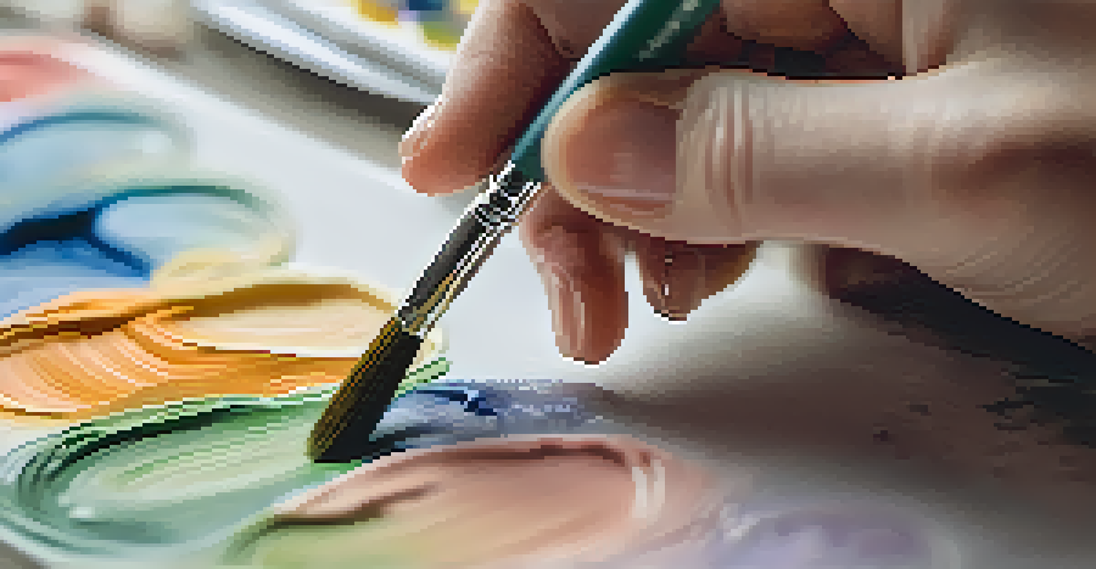 A close-up of a watercolor painting being created, highlighting soft pastel colors and delicate brush strokes, with an artist's hand holding a brush.