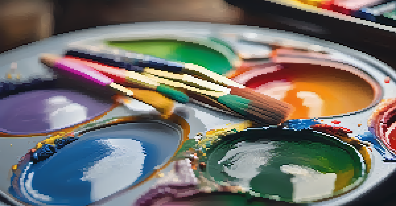 A close-up of an artist's palette with vibrant paint colors and an artist's hand holding a brush above it.