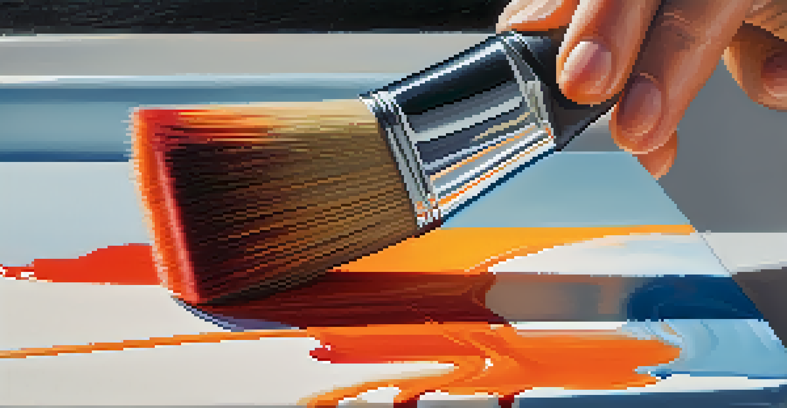 A close-up view of a brush applying warm colors over a cool base layer on a canvas, highlighting the texture and blending of colors.