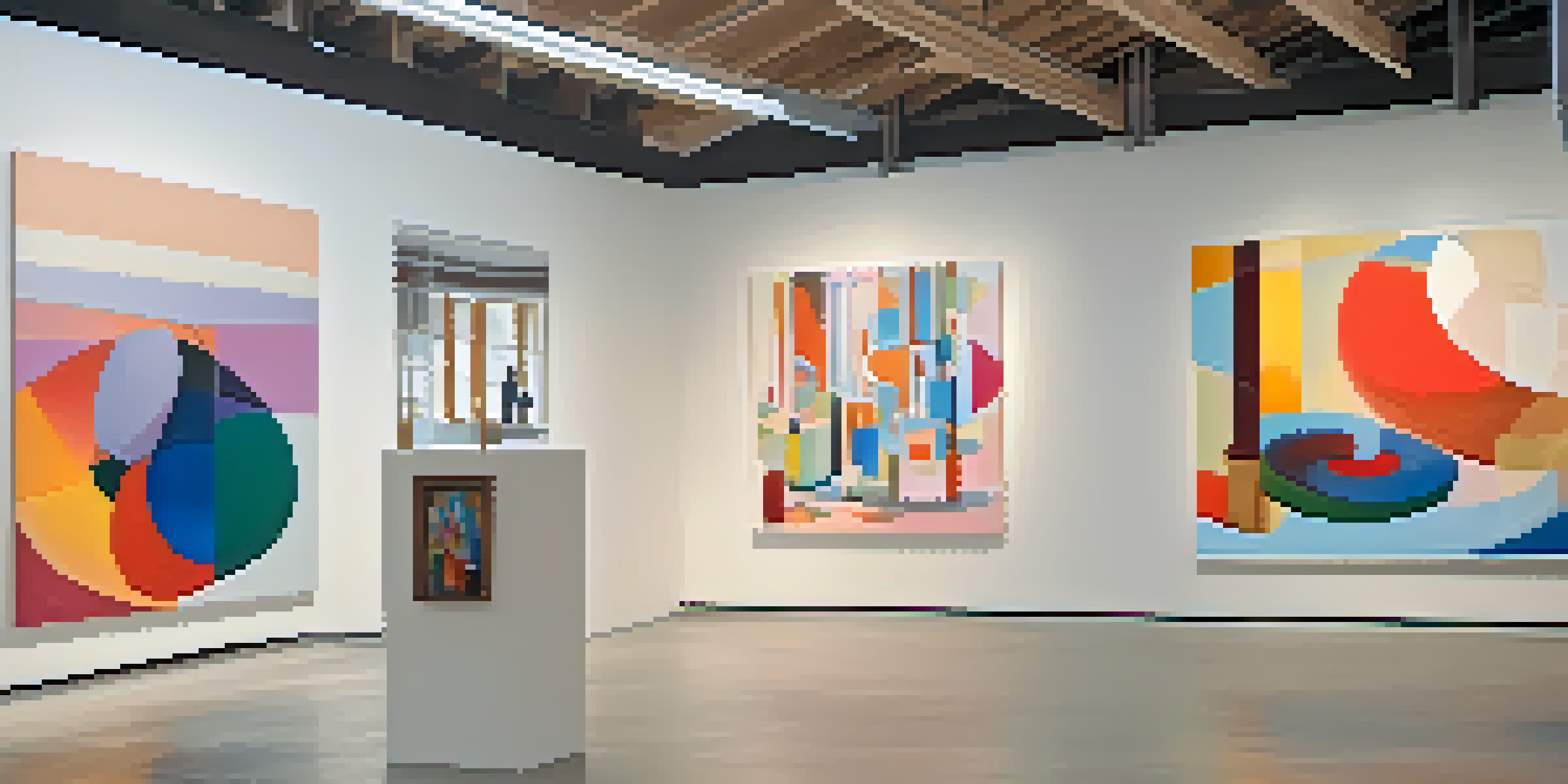 A bright art gallery filled with colorful abstract paintings created by women artists, with visitors admiring the artwork.