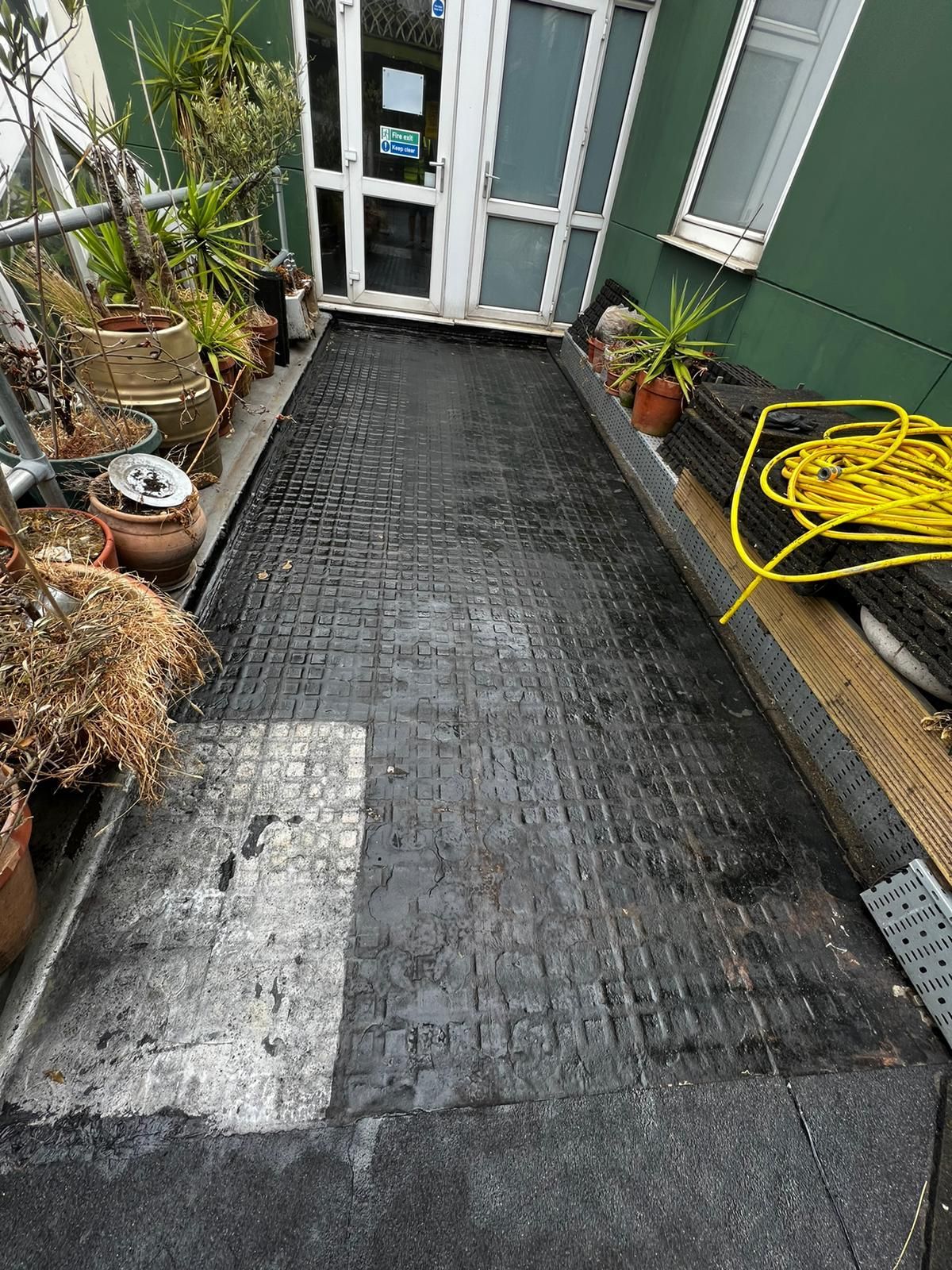 Terrace after black waterproof membrane application