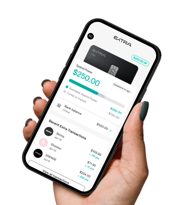 Hand holding phone showing Extra app spend power