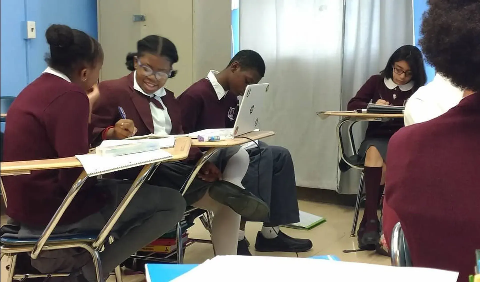 Learning Tree students at their desks, working through a lesson together