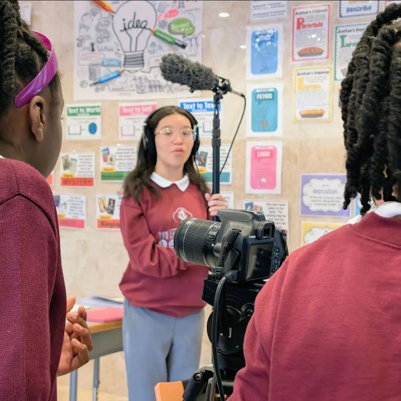 A student behind the camera on a Media Arts Lab shoot