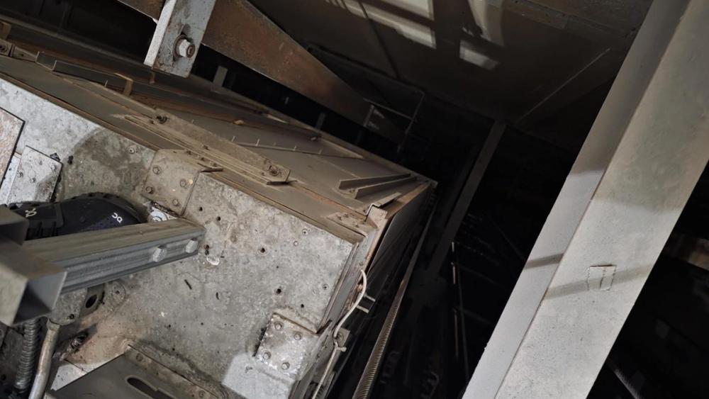 Elevator car shell showing wood construction