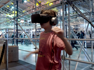 Young man having fun with a virtual reality headset