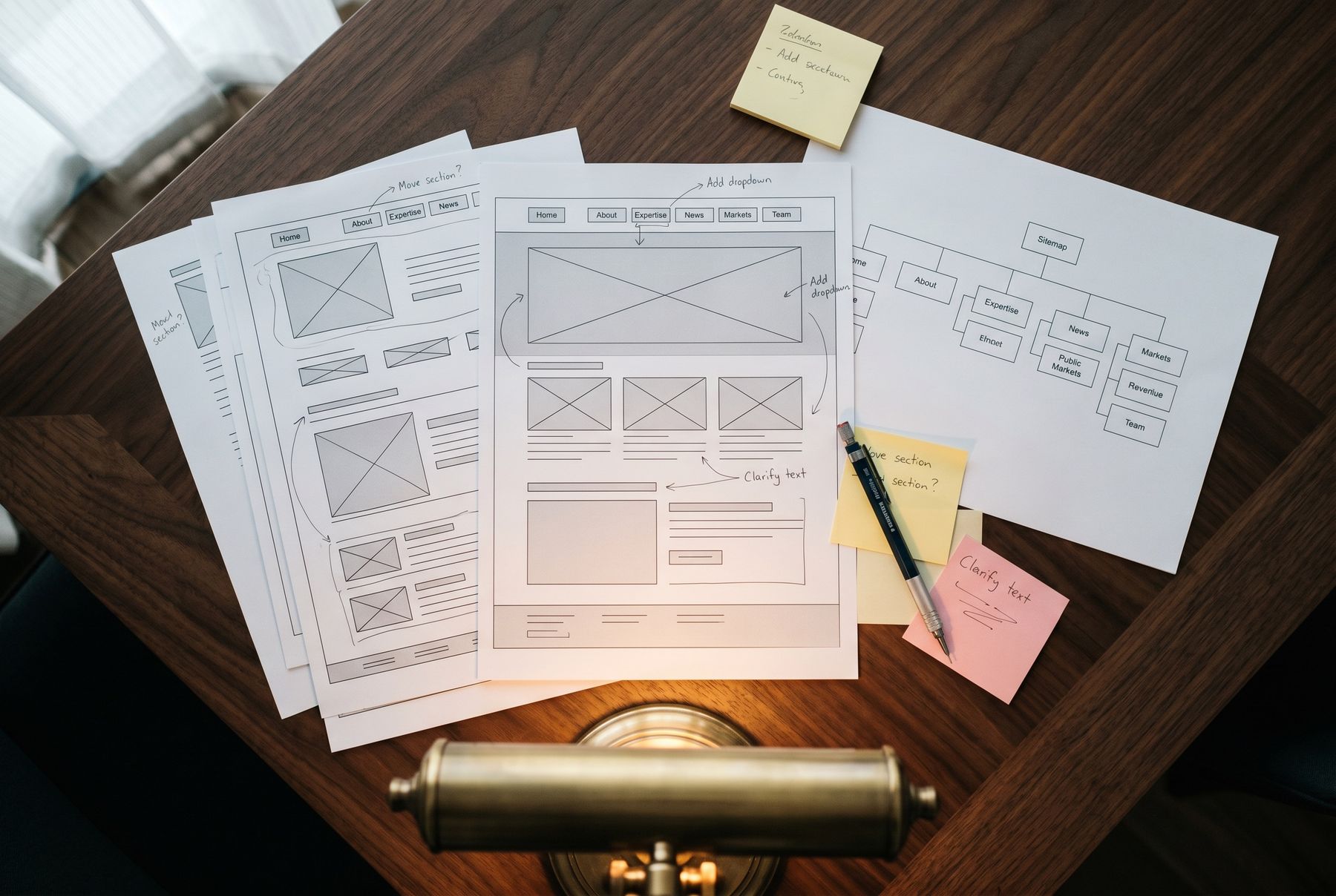 Low-fidelity structure first: page hierarchy and layout decisions on paper before a single pixel.