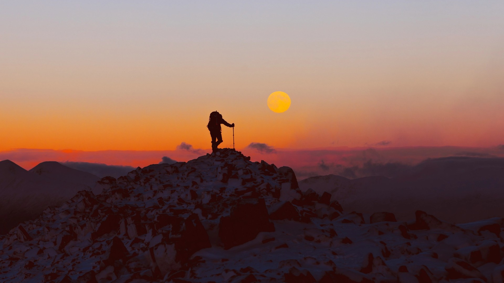 Image of a hiker on a mountain-climbing adventure