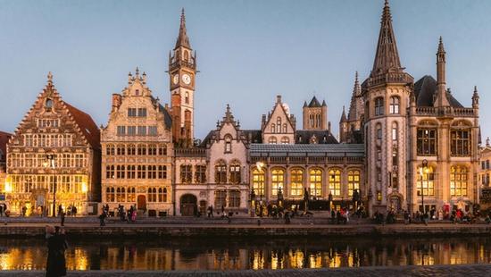Iconic medieval architecture along the waterside in Ghent
