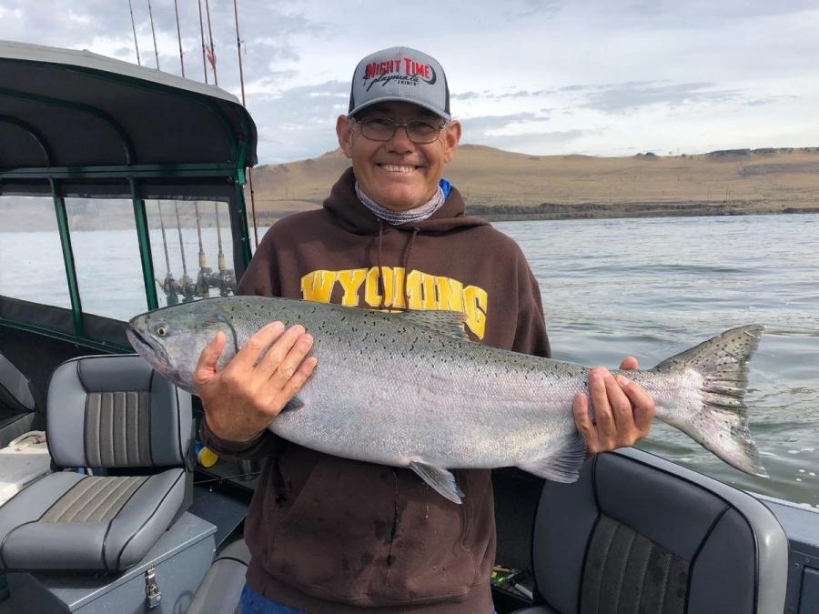 Angler holding a Columbia River spring salmon
