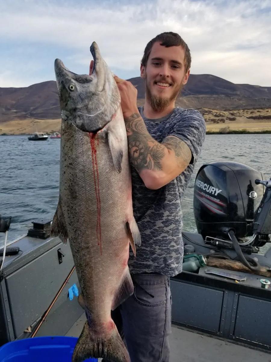 Angler holding a large salmon