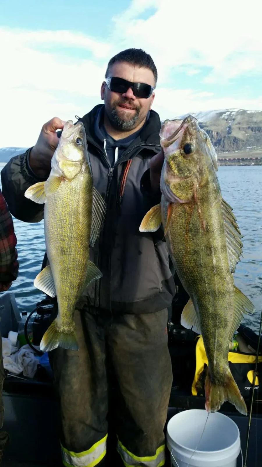 Angler holding walleye