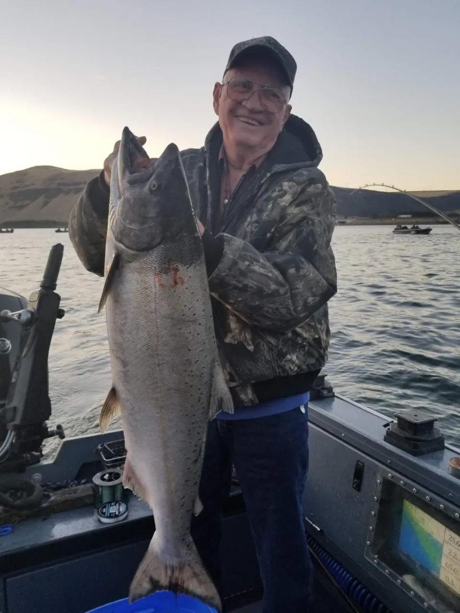 Angler holding a large Columbia River salmon