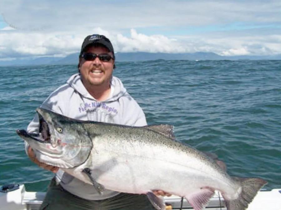 Angler holding a Columbia River salmon