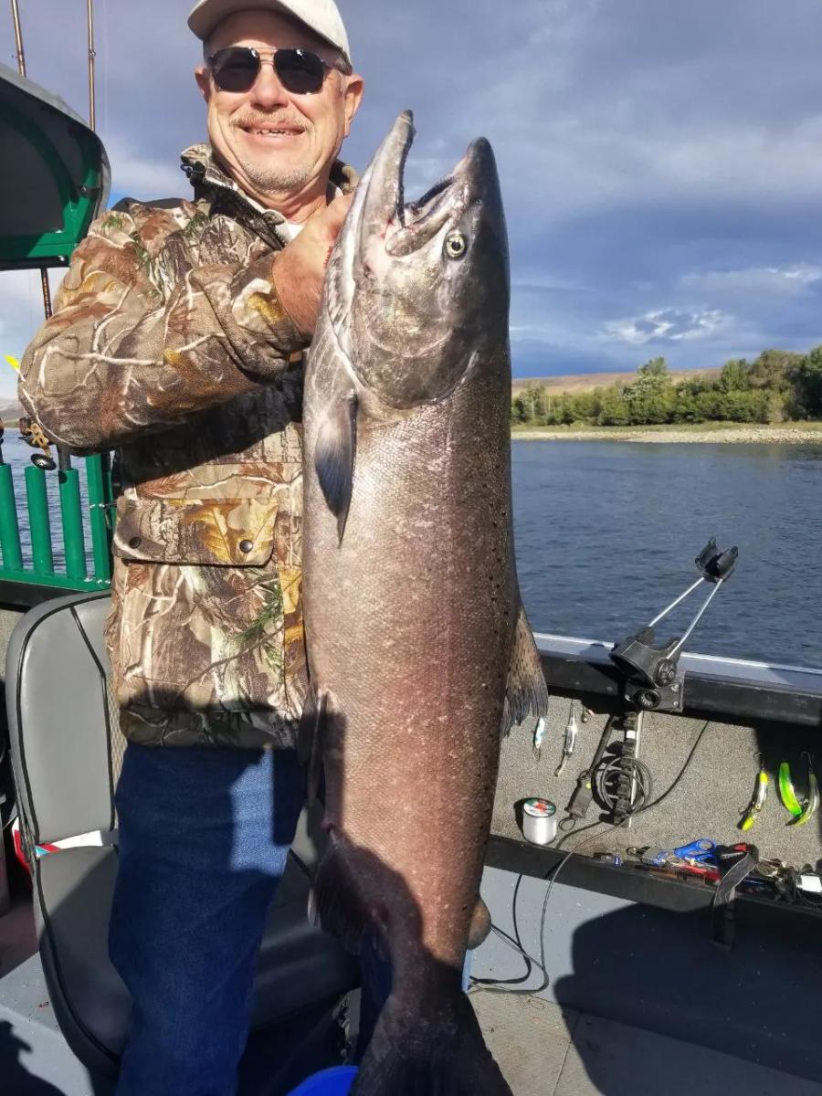Angler holding a large salmon