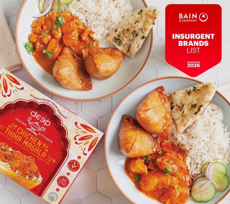 Chicken Tikka Masala entree next to Bain award badge