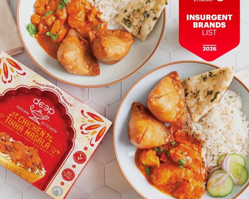 Chicken Tikka Masala entree next to Bain award badge