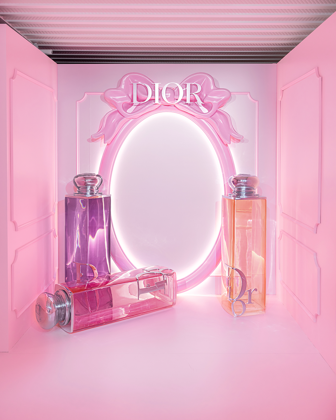 Dior Sweet Shop pop-up photocall in Tokyo with giant perfume bottles.