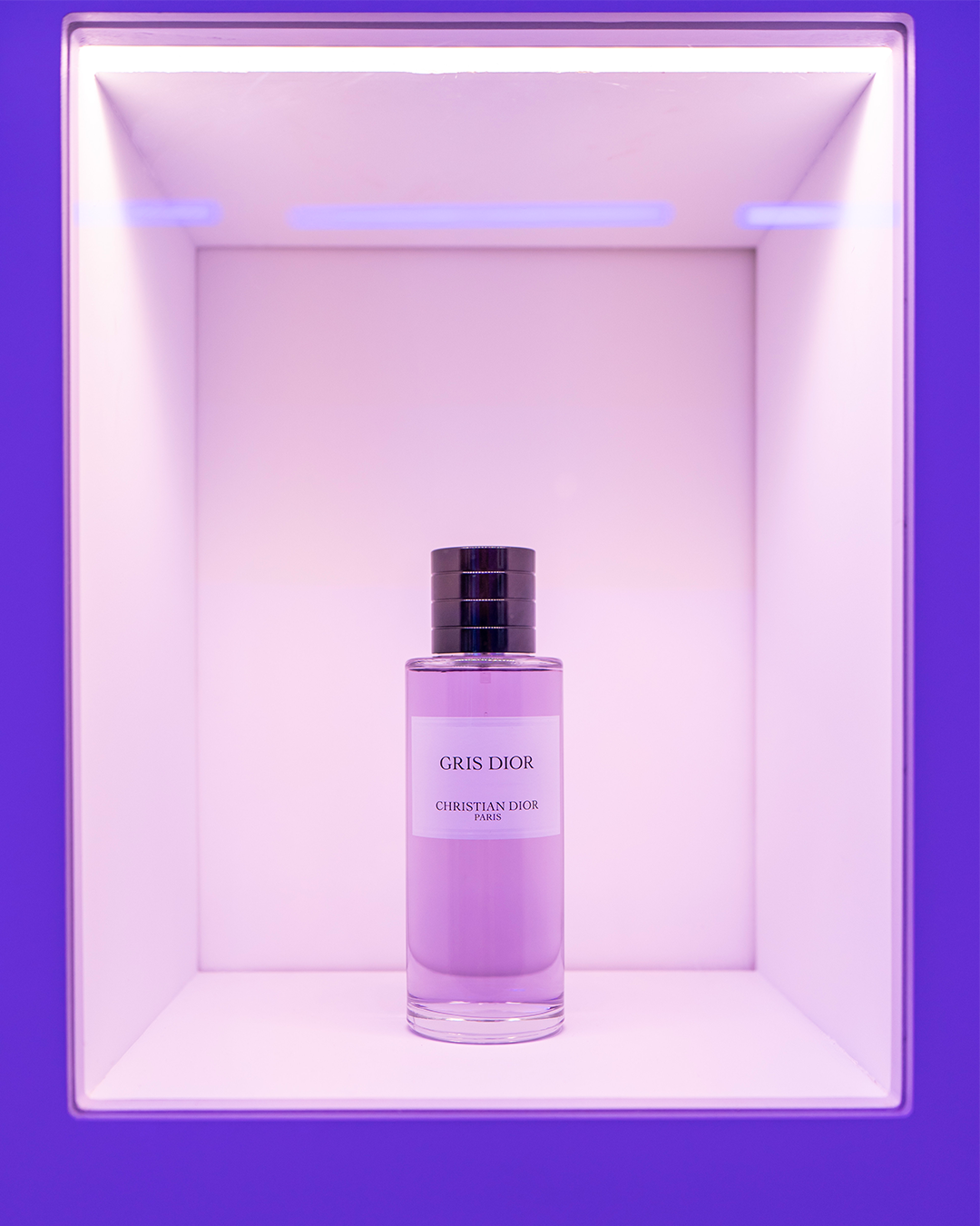 Gris Dior perfume bottle at Dior Grey Zone exhibition in Los Angeles.