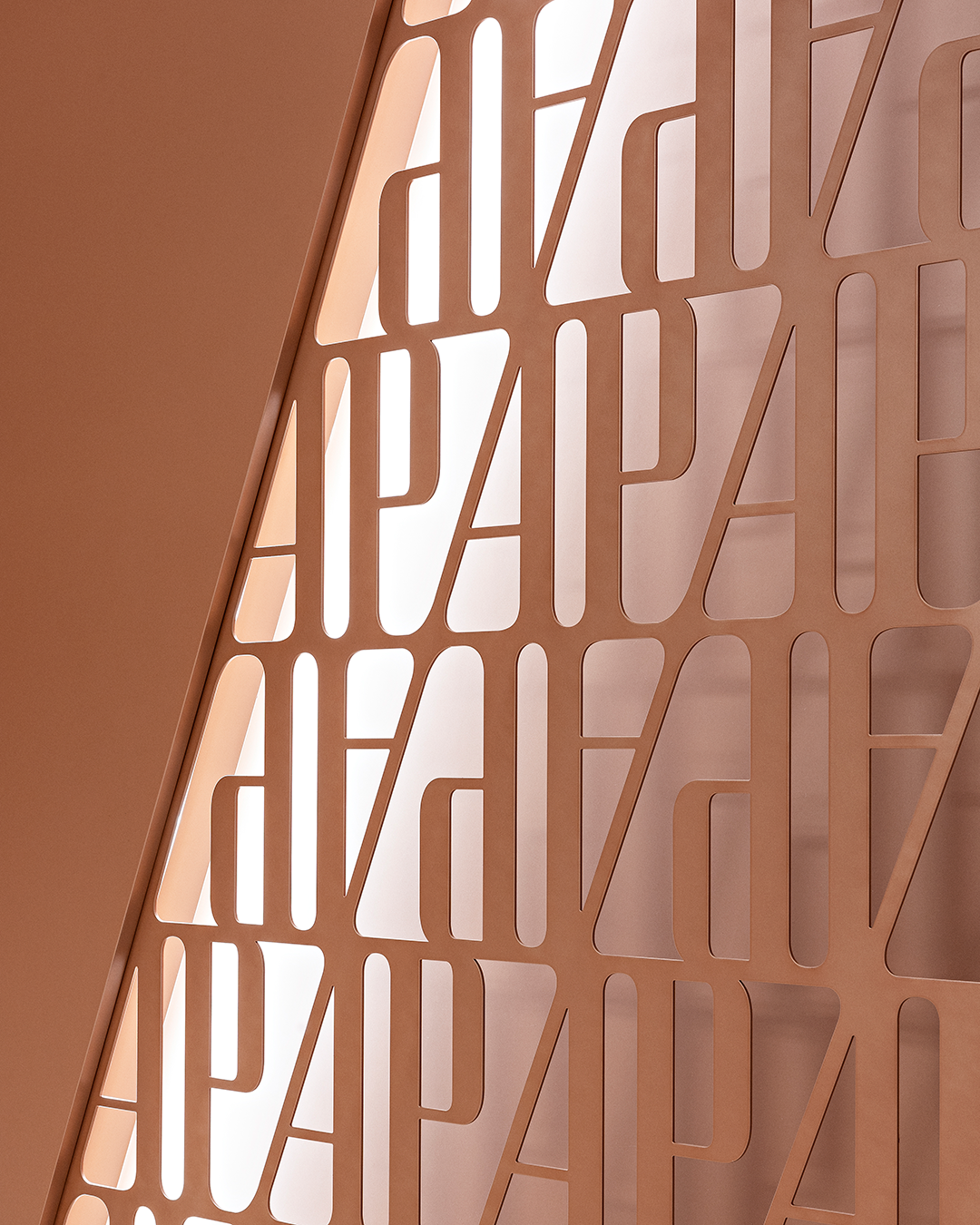 Audemars Piguet branded wall details inside the Shaping Materials exhibition in Milan.