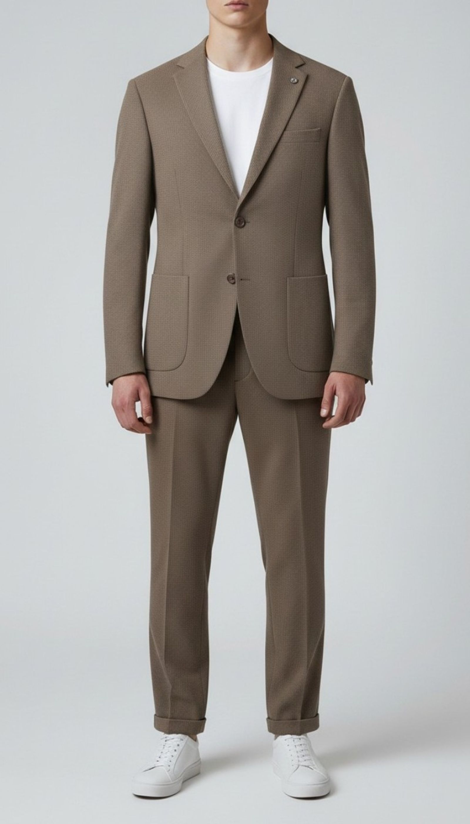 Viento  brown textured suit worn open over a white tee with white trainers, full-length front view.