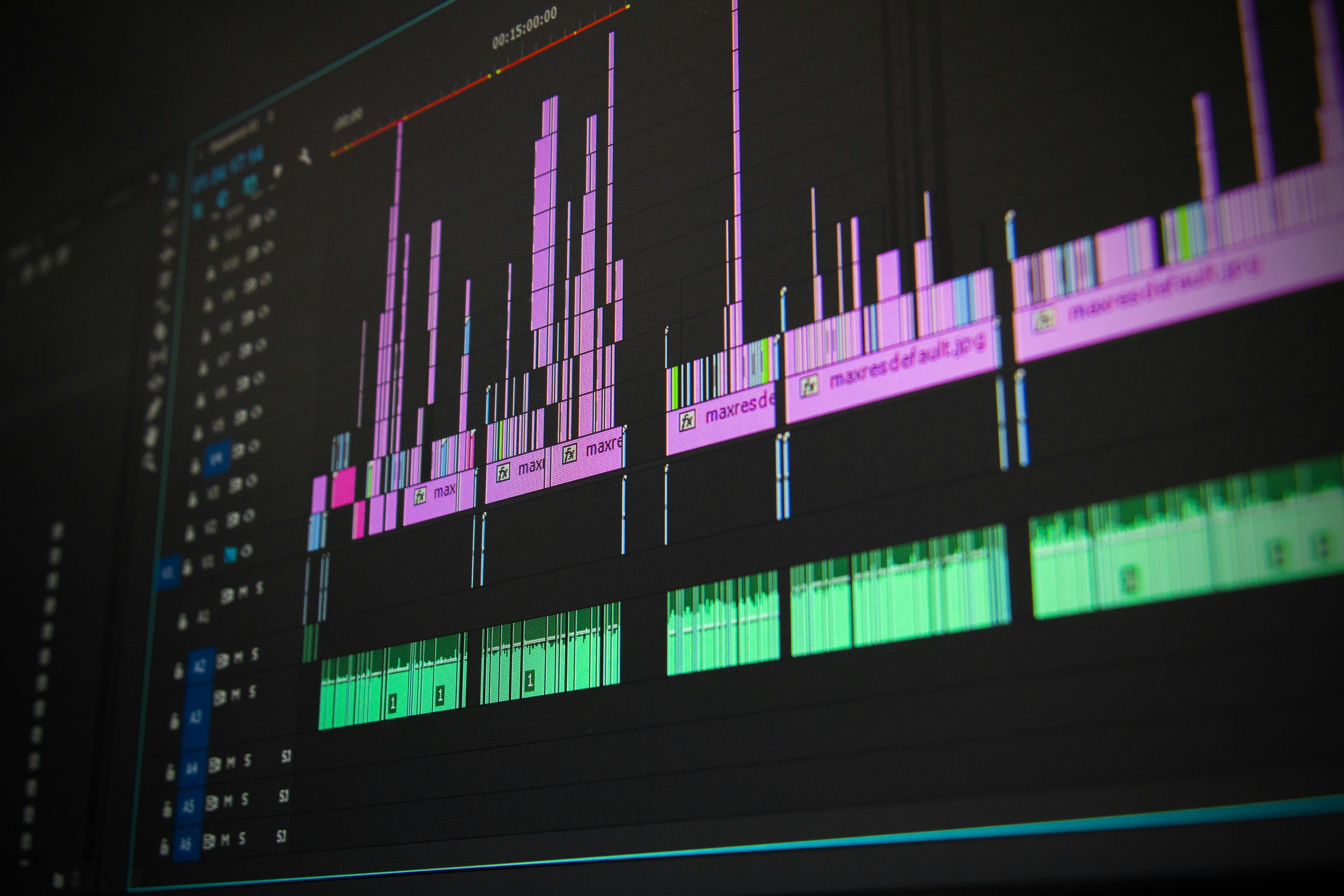 Editing timeline with color-coded tracks.