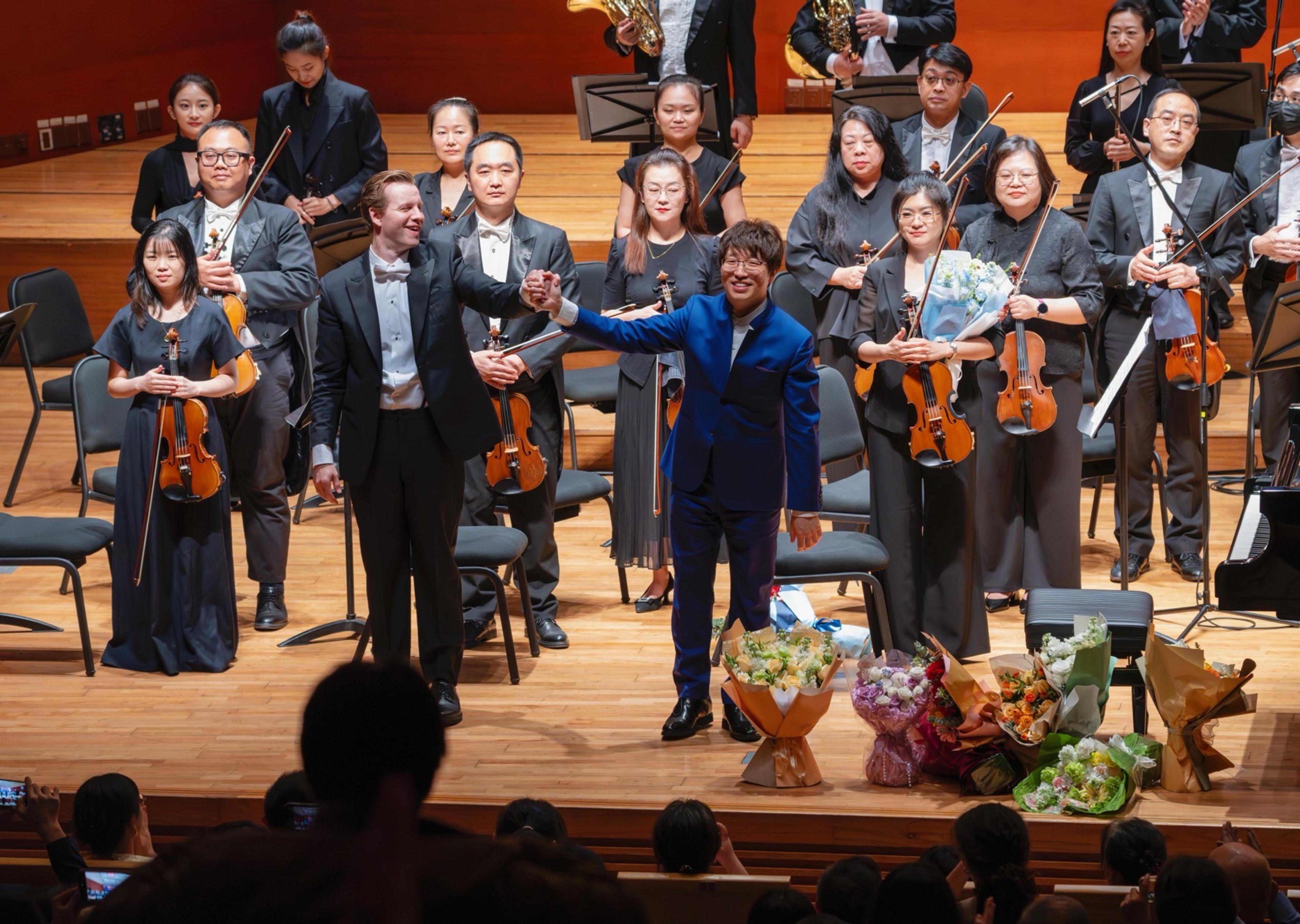 Tristan and Yuan Jie take a bow