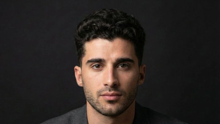 Clean professional headshot for a dentist or dental team profile