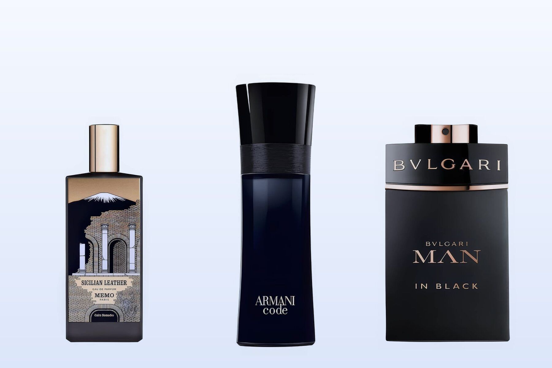Three bottles on a pale blue background, Sicilian Leather by Memo Paris, Armani Code and Man In Black by Bvlgari
