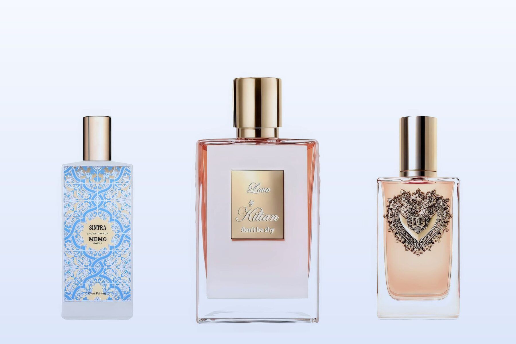 Three bottles, Sintra by Memo Paris, Love Don't Be Shy by By Kilian and Devotion by Dolce&Gabbana, on a pale blue background