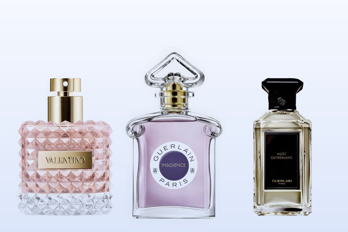 Valentino Donna, Guerlain Insolence Eau de Parfum and Guerlain Musc Outreblanc on a pale blue background