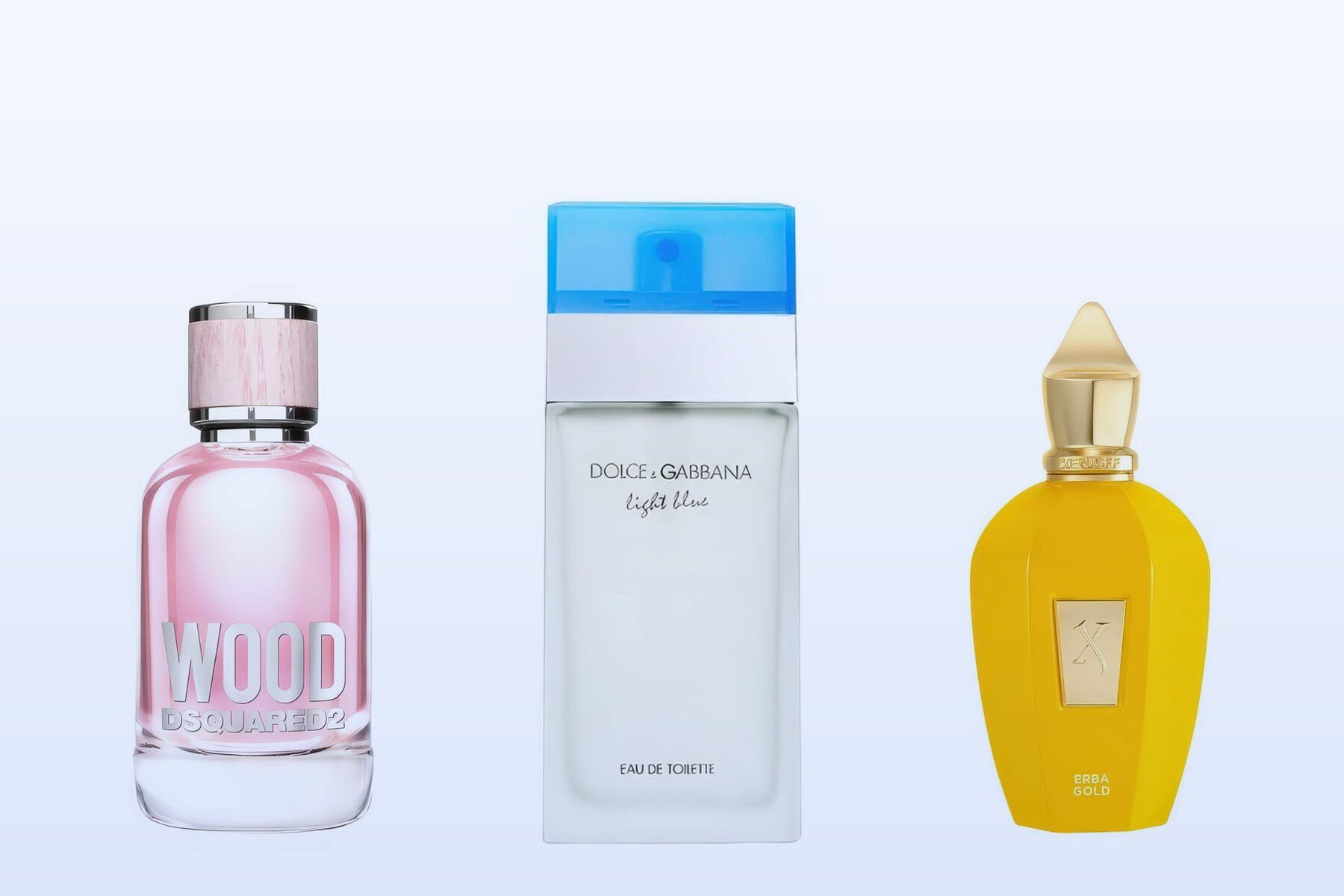 Three bottles on a pale blue background, Wood for Her, Light Blue and Erba Gold
