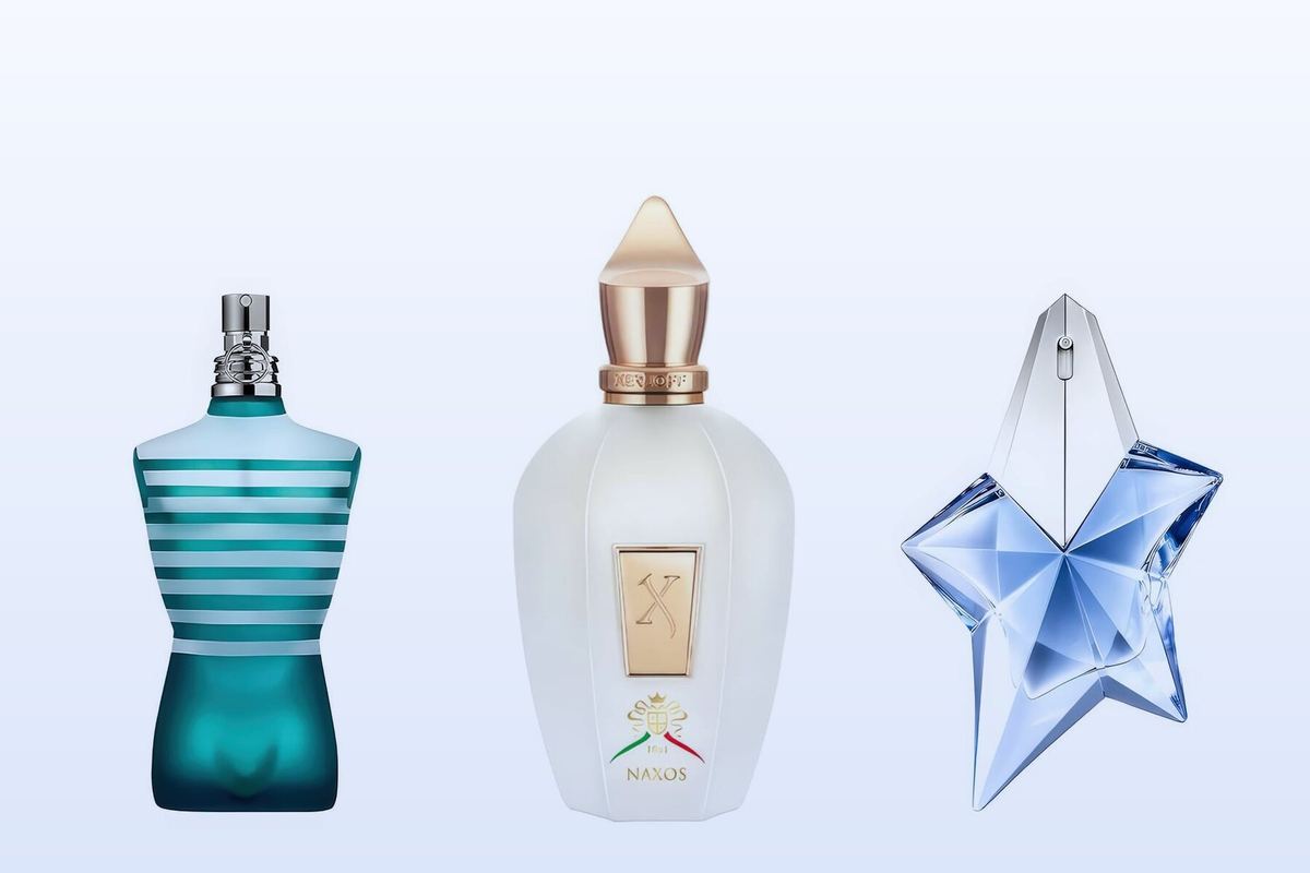 Three fragrance bottles, Le Male, XJ 1861 Naxos and Angel, on a pale blue background