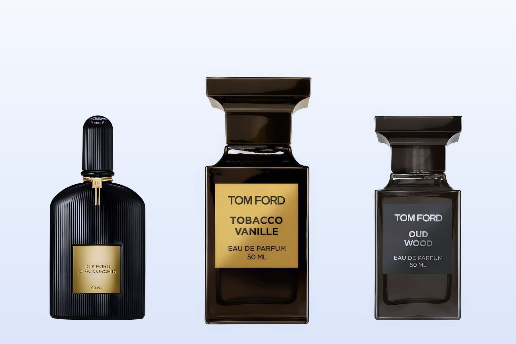 Three fragrance bottles, Black Orchid, Tobacco Vanille and Oud Wood, on a pale blue background