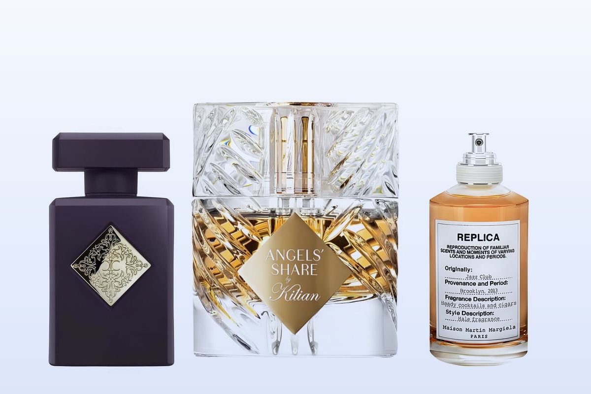 Three bottles on a pale blue background, Can't Get Enough by Initio, Angels' Share by Kilian and Jazz Club by Maison Margiela
