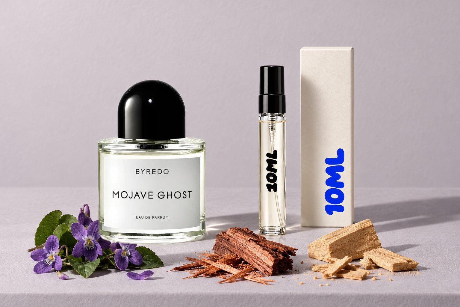 Mojave Ghost by Byredo next to a 10ML decant, with violet, cedarwood and sandalwood, its key notes