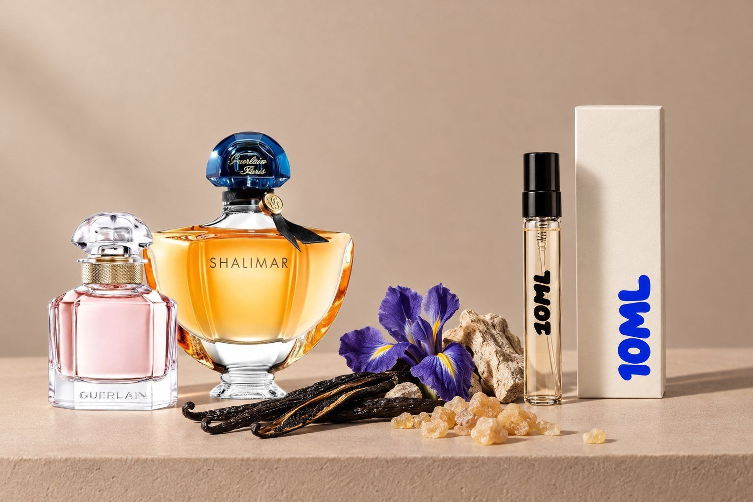 Shalimar e Mon Guerlain di Guerlain accanto a un decant 10ML, con vaniglia, iris e incenso tra le loro note