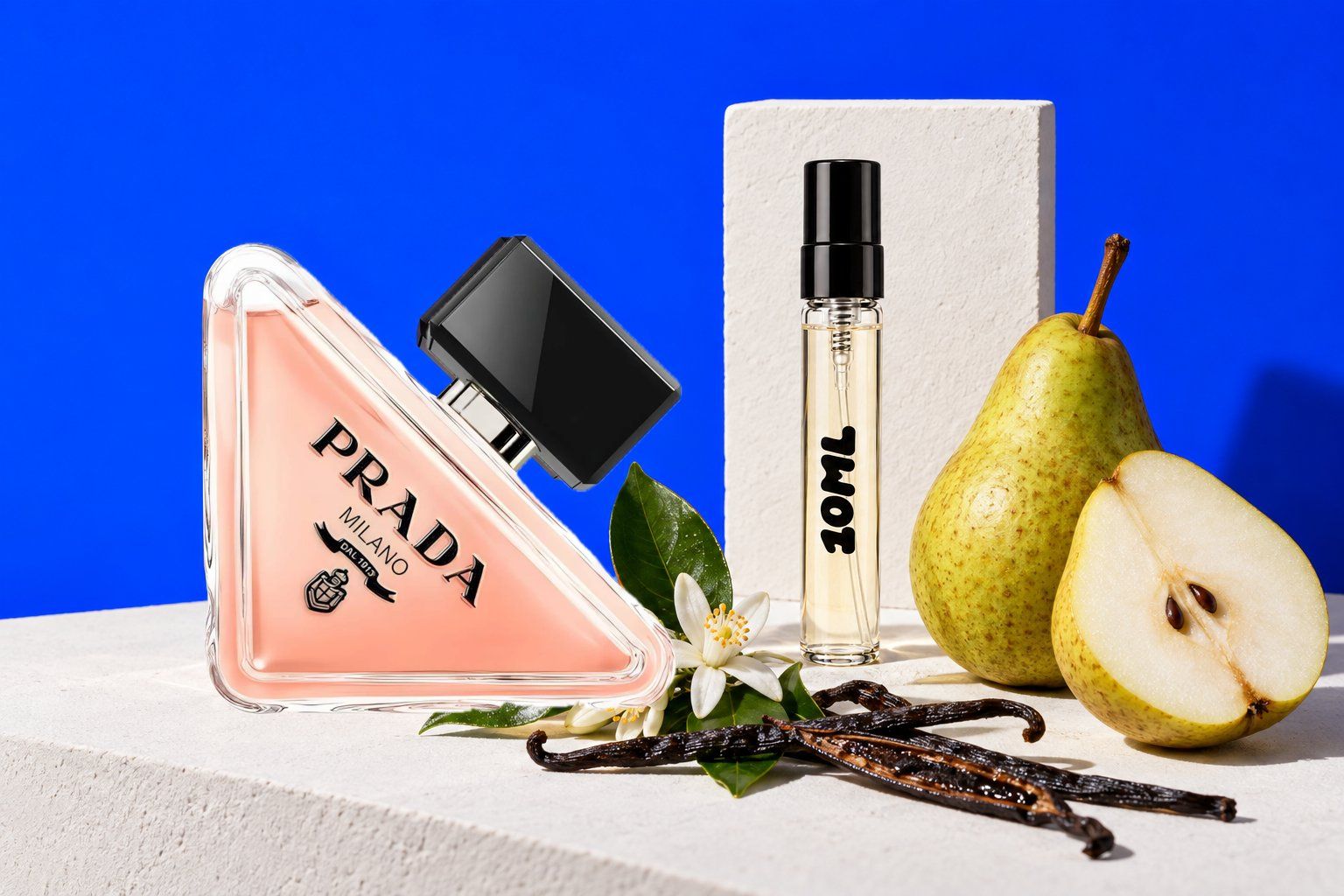Paradoxe by Prada next to a 10ML decant, with pear, neroli and vanilla, its key notes